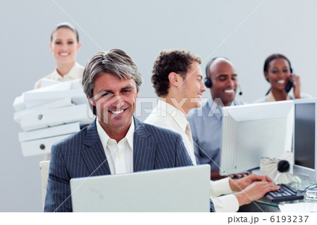 Portrait of a smiling business team at work 6193237