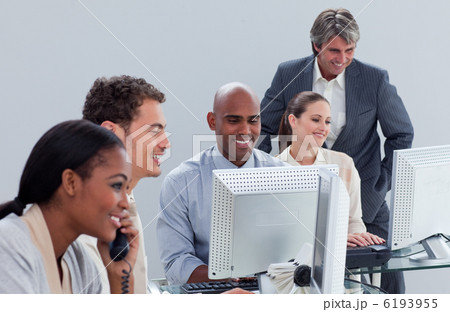 Confident business team at work Confident business team at work 6193955