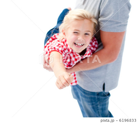 Close-up of little girl enjoying piggyback ride with her father Close-up of little girl enjoying piggyback ride with her father 6196833