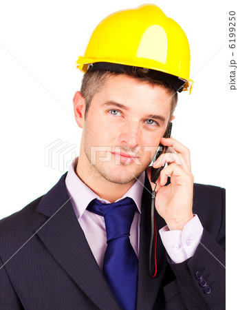 Construction worker talking on the phone Construction worker talking on the phone 6199250