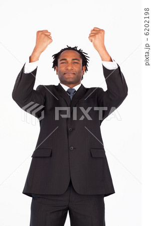 Young businessman with raised arms Young businessman with raised arms 6202198