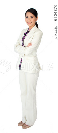 Attractive asian businesswoman standing with folded arms Attractive asian businesswoman standing with folded arms 6204876