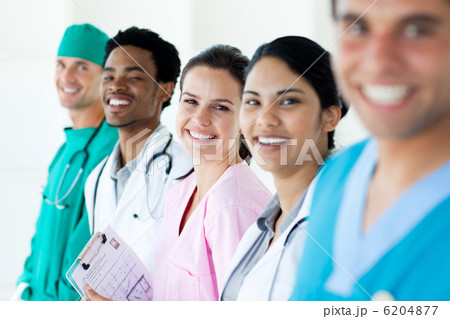 Smiling medical team in a line 6204877