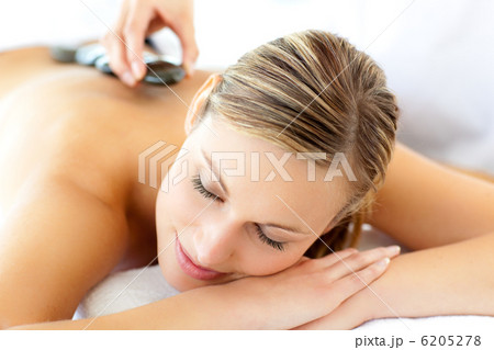 Attractive woman having a massage 6205278