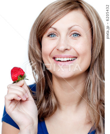 Attractive woman eating strawberries Attractive woman eating strawberries 6205432