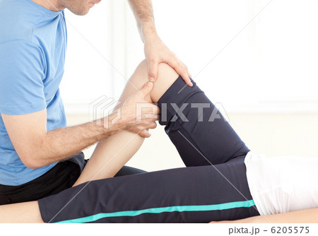 Close-up of a handsome man doing a massage 6205575
