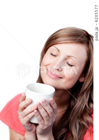 Beautiful woman drinking a cup of tea 6205577