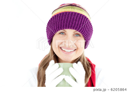 Joyful woman holding a cup a coffee 6205864