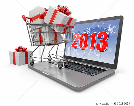 Happy new year 2013. Laptop and gifts on shopping cart. 6212937