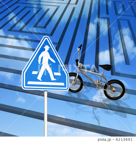 青空の下の道路標識 自転車横断帯のイラスト素材