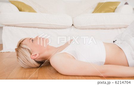 Cute blond-haired woman doing fitness exercises 6214704