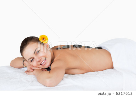 Young woman having a LaStone therapy Young woman having a LaStone therapy 6217612