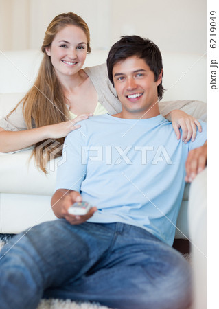 Portrait of a couple watching television 6219049