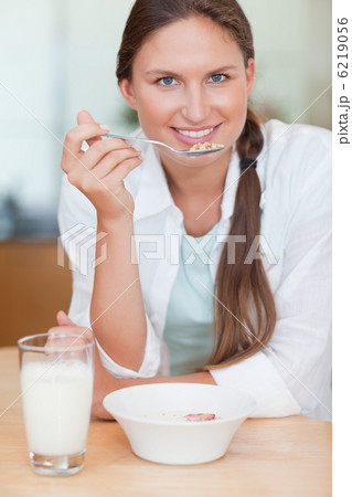 Portrait of a cute woman having breakfast Portrait of a cute woman having breakfast 6219056