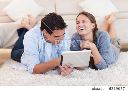 Beautiful couple using a tablet computer 6219077