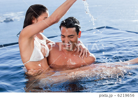 Man holding his playful wife Man holding his playful wife 6219656