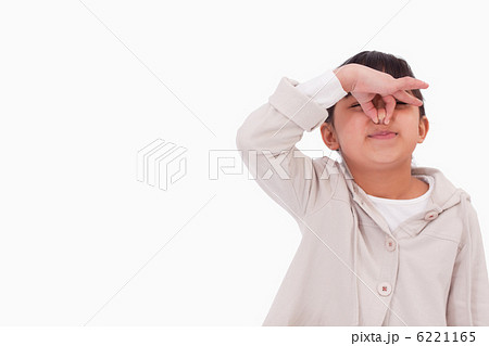 Girl pinching her nose Girl pinching her nose 6221165