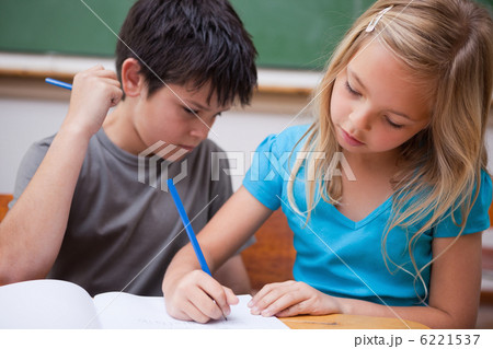 Focused pupils working together Focused pupils working together 6221537