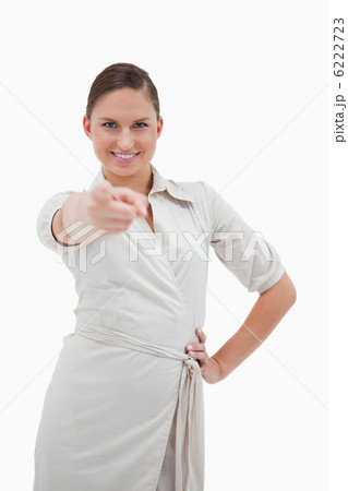 Portrait of a smiling businesswoman pointing at the viewer 6222723