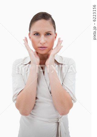 Portrait of a businesswoman with her hands around her face 6223156