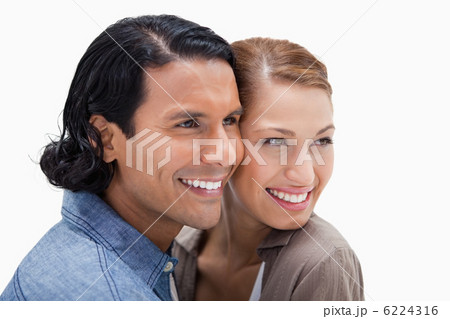 Side view of close together standing couple Side view of close together standing couple 6224316