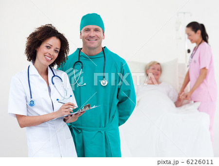 Medical team taking notes Medical team taking notes 6226011