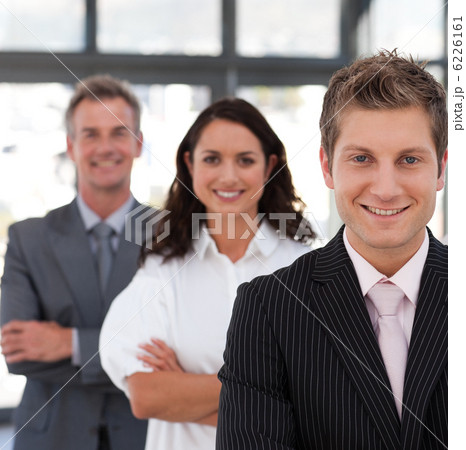 Smiling business team looking at the camera 6226161