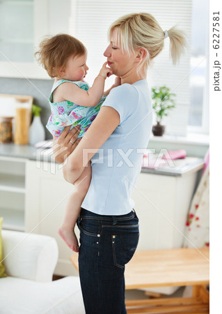 Young mother playing with her daughter Young mother playing with her daughter 6227581