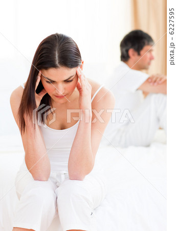 Distress couple sitting sitting separately after having a row 6227595