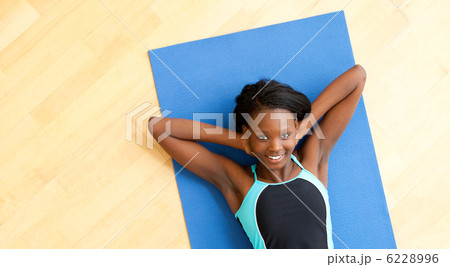 Smiling woman doing fitness 6228996