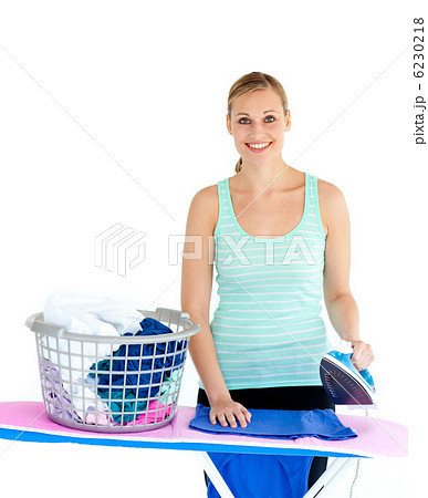 Happy woman ironing Happy woman ironing 6230218