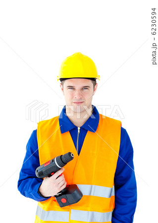 Assertive worker holding a cordless screwdriver 6230594