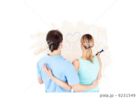 Kind young couple painting a room Kind young couple painting a room 6231549