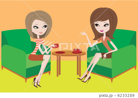 Two young women talk in armchairs 6233289
