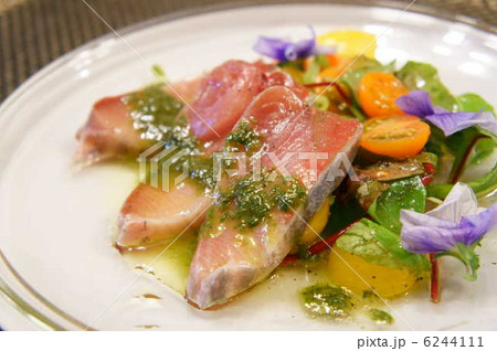 寒ブリのフルーツサラダ仕立て ハーブソースの写真素材