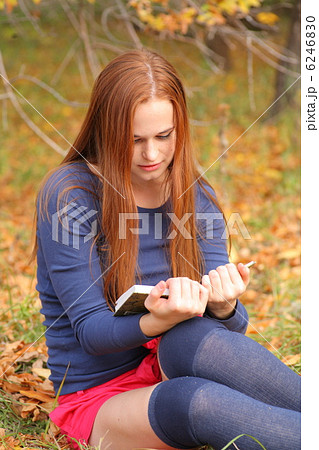 beautiful girl holding an open book beautiful girl holding an open book 6246830