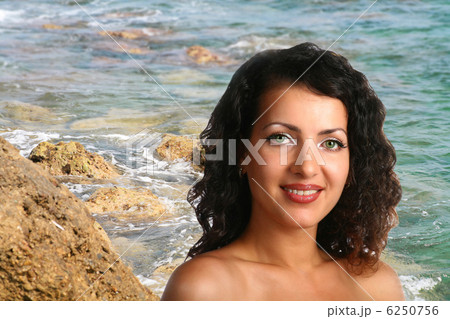 brunette outdoors against sea 6250756