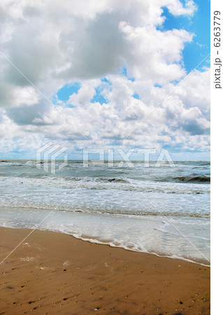 Cloudy sky over the stormy sea 6263779