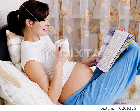 pregnant woman has a rest at home pregnant woman has a rest at home 6269325
