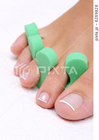 Single  woman foot with pedicure tool 6269828