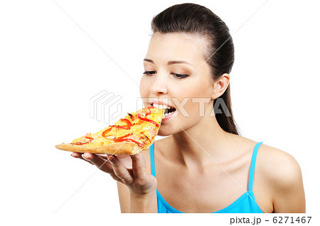woman eating piece of pizza woman eating piece of pizza 6271467