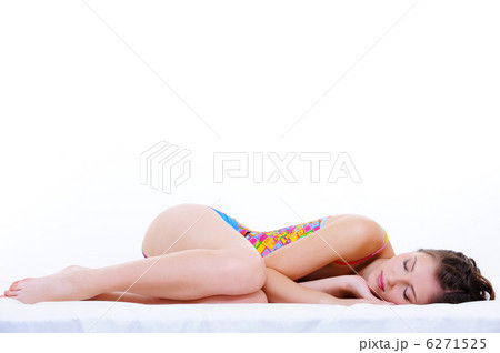 Full-length portrait of female sleeping snuggle Full-length portrait of female sleeping snuggle 6271525