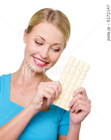 woman wishes to eat a tile of chocolate woman wishes to eat a tile of chocolate 6272147