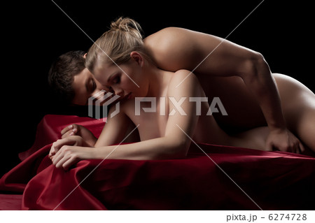 Couple having sex in silk sheet 6274728