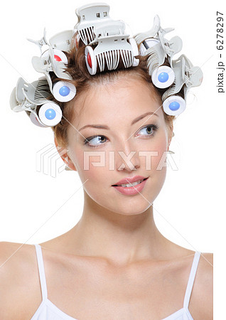 young smiling female with curlers 6278297