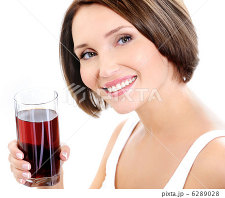 Beautiful woman with glass of juice 6289028
