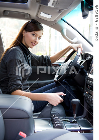 Young woman in the new car 6289196