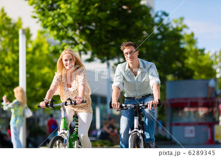 urban couple riding bike in free time in city 6289345