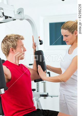 Patient at the physiotherapy doing physical therapy 6298226