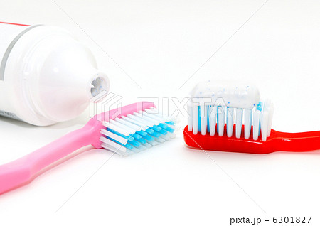 Tooth paste and brush isolated on white background Tooth paste and brush isolated on white background 6301827